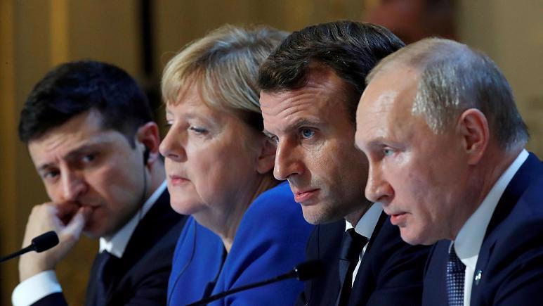 Từ trái qua: Tổng thống Ukraine Volodymyr Zelenskiy, Thủ tướng Đức Angela Merkel, Tổng thống Pháp Emanuel Macron, và Tổng thống Nga Vladimir Putin trong một cuộc gặp ở Paris, Pháp, vào tháng 9/2019 - Ảnh: Reuters.